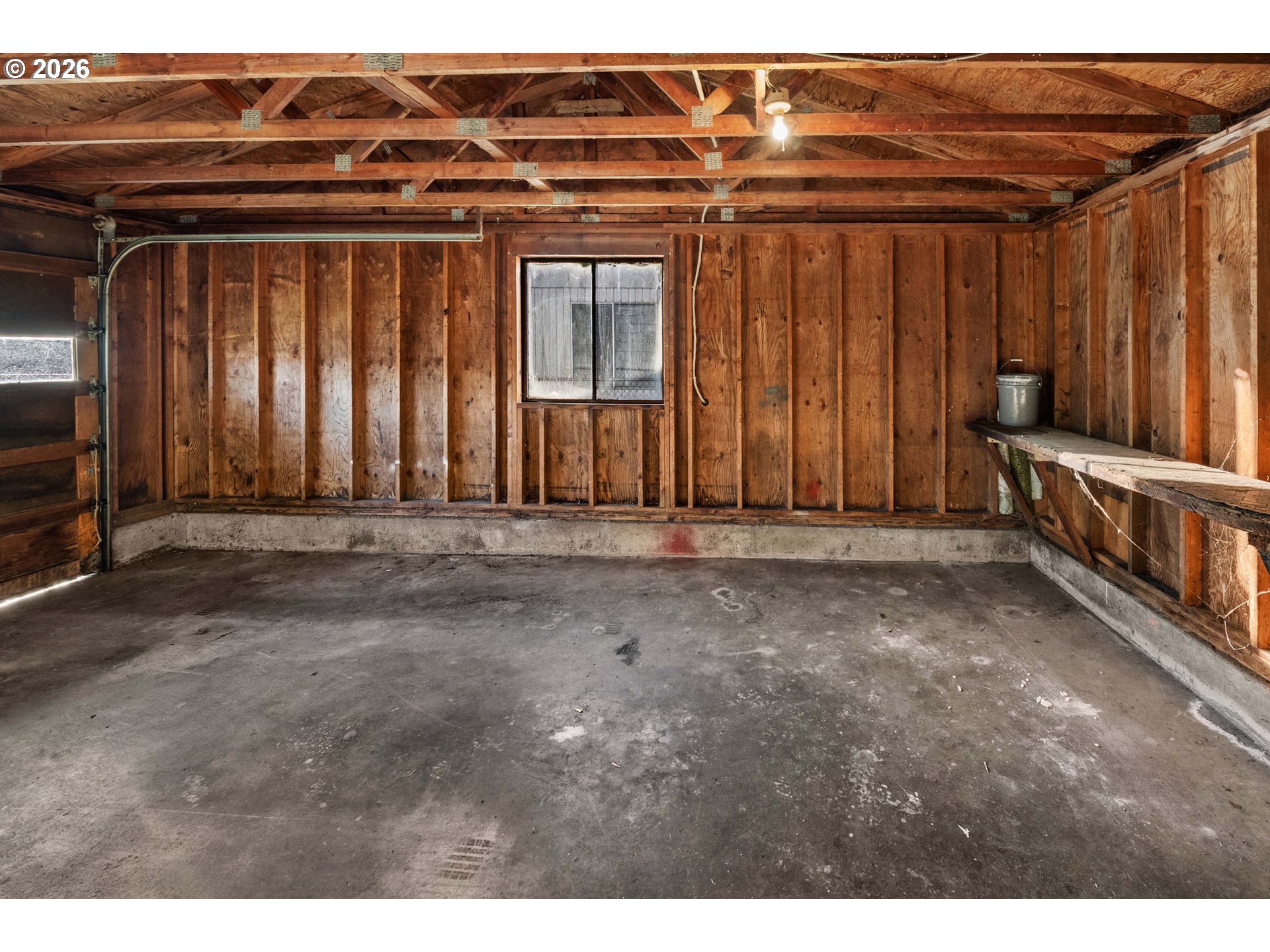 2440 Pine Street Seaside, OR 97138 - Photo 14 of 22 a view of a room with wooden walls