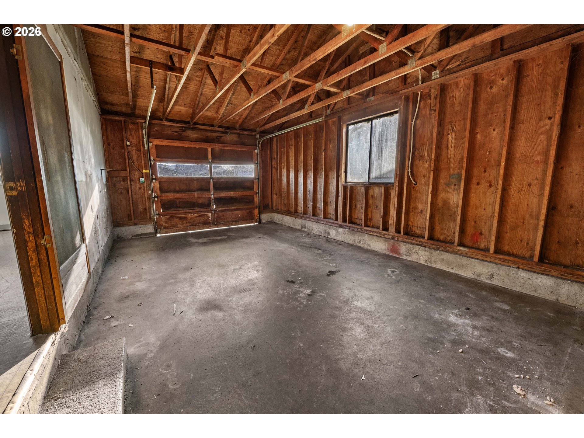 2440 Pine Street Seaside, OR 97138 - Photo 15 of 22 a view of an empty room with a fireplace