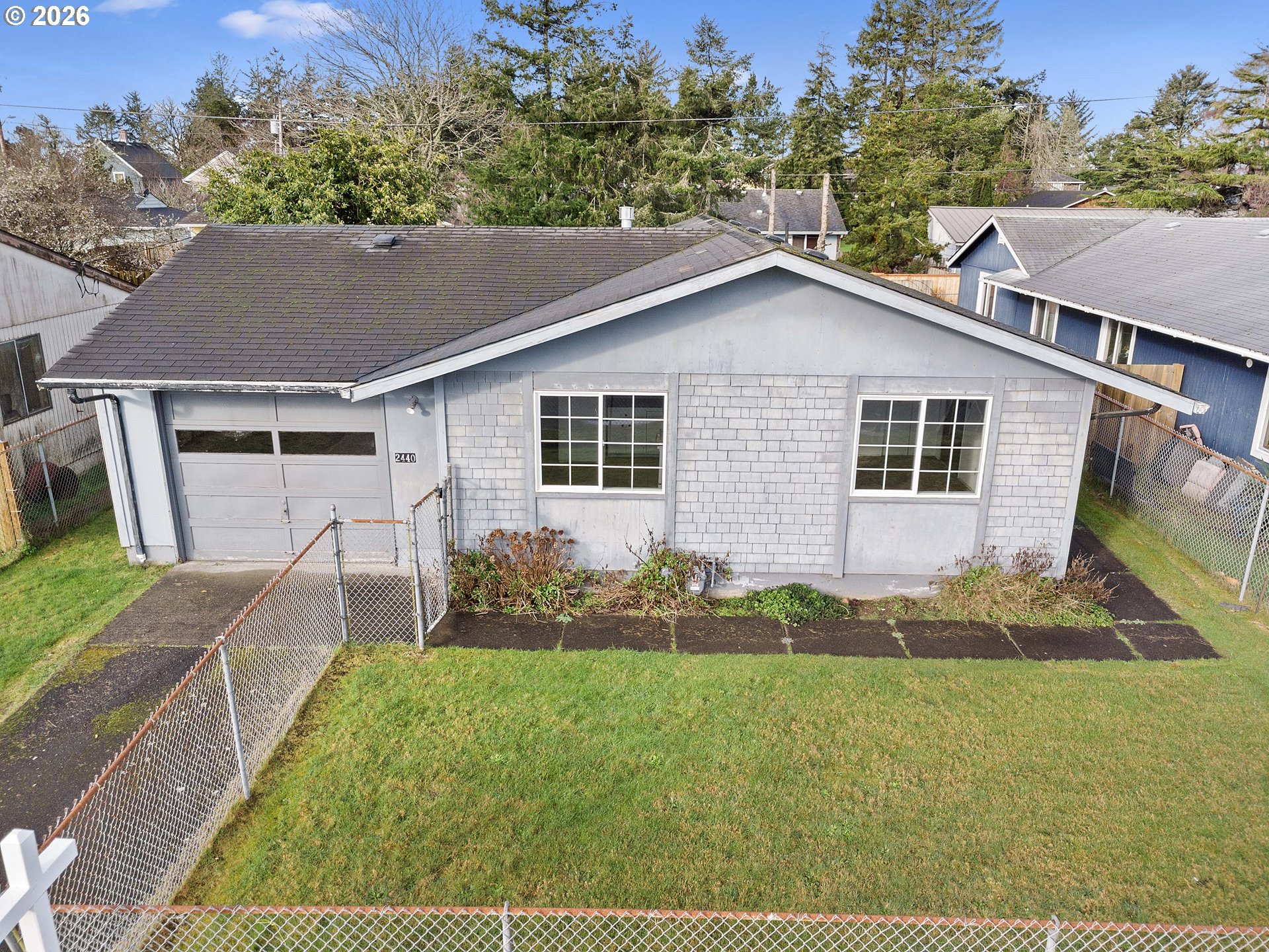 2440 Pine Street Seaside, OR 97138 - Photo 2 of 22 a aerial view of a house