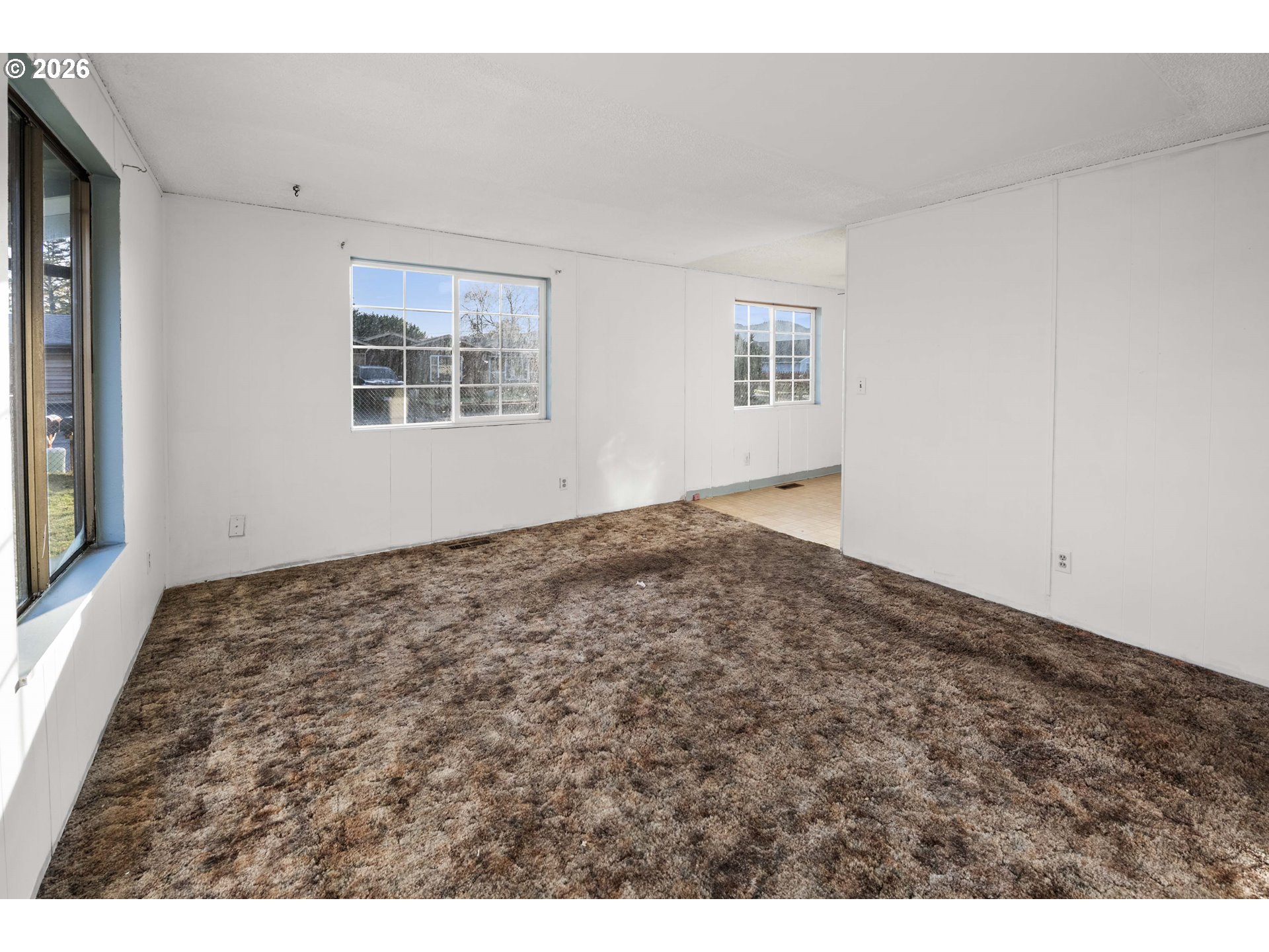2440 Pine Street Seaside, OR 97138 - Photo 3 of 22 a view of empty room with wooden floor