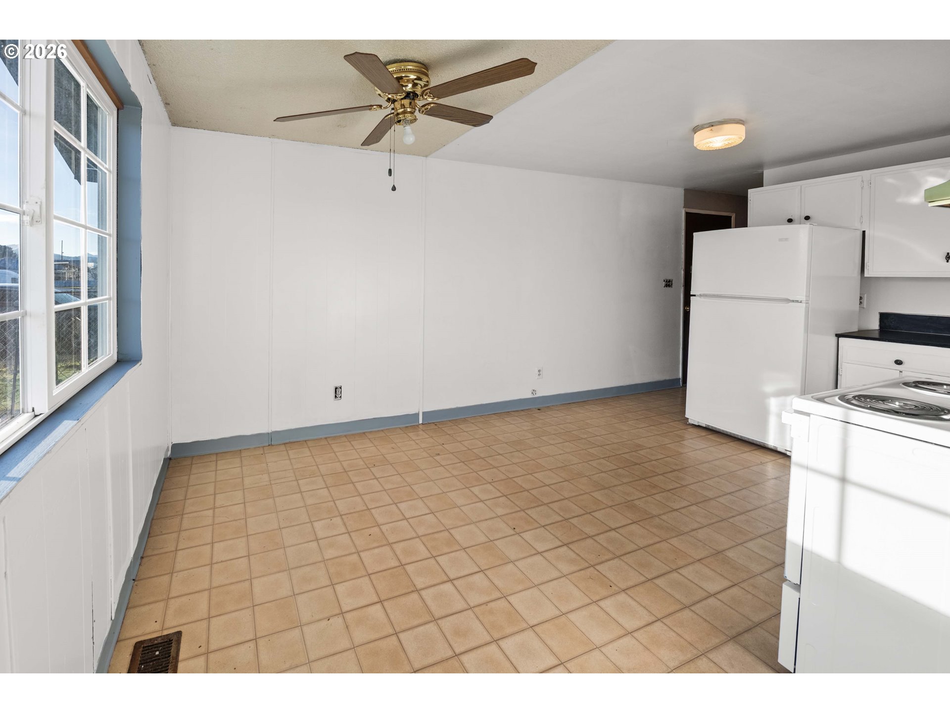 2440 Pine Street Seaside, OR 97138 - Photo 5 of 22 a view of storage and utility room with washer and dryer