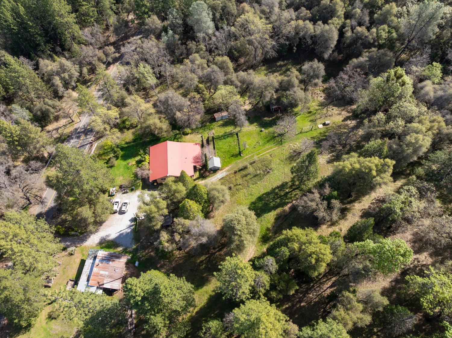 3640 Omo Ranch Road Somerset, CA 95684 - Photo 47 of 57 a aerial view of a yard with yellow house