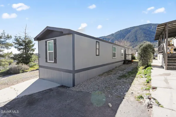 a house view with a outdoor space
