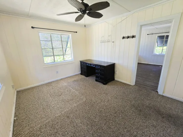 a view of an empty room and window