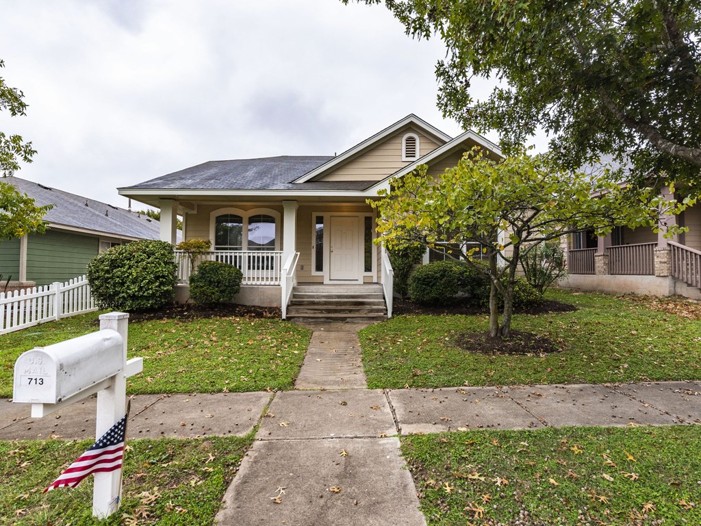 713 Hogan Kyle, TX 78640 - Photo 1 of 1 front view of a house with a yard