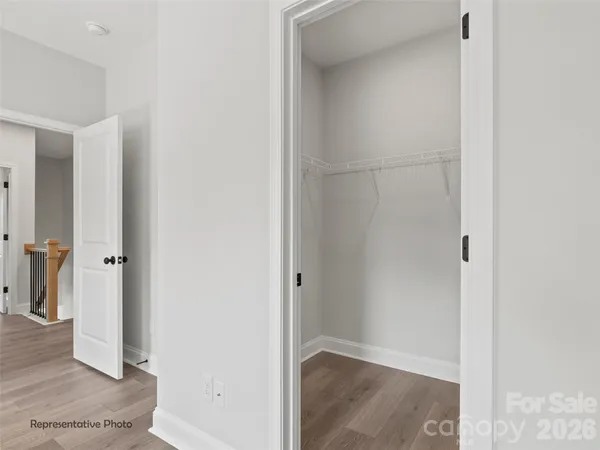 a bathroom with a mirror and a sink