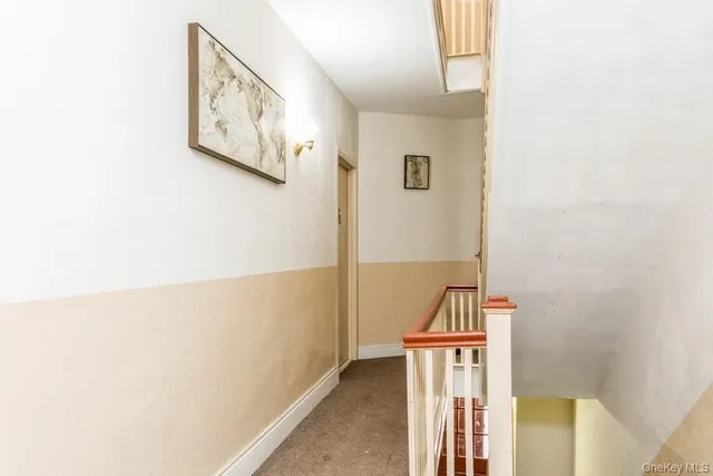 a view of hallway with stairs