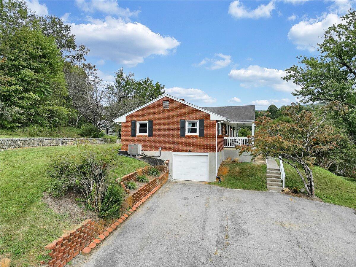 1390 Blue Ridge Springs Road Blue Ridge, VA 24064 - Photo 35 of 54 a view of house with backyard and garden