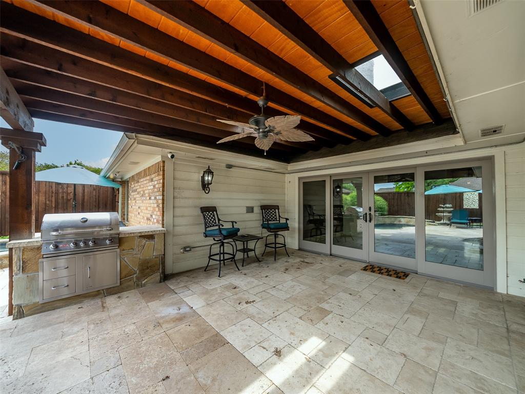 2516 Pepper Tree Circle McKinney, TX 75072 - Photo 7 of 40 Wonderful back patio to grill just hang out and stay cool! Perfect to a dining area or a great couch and chairs. Great sliding doors that open all the way so you can enjoy the outdoors when you are inside!