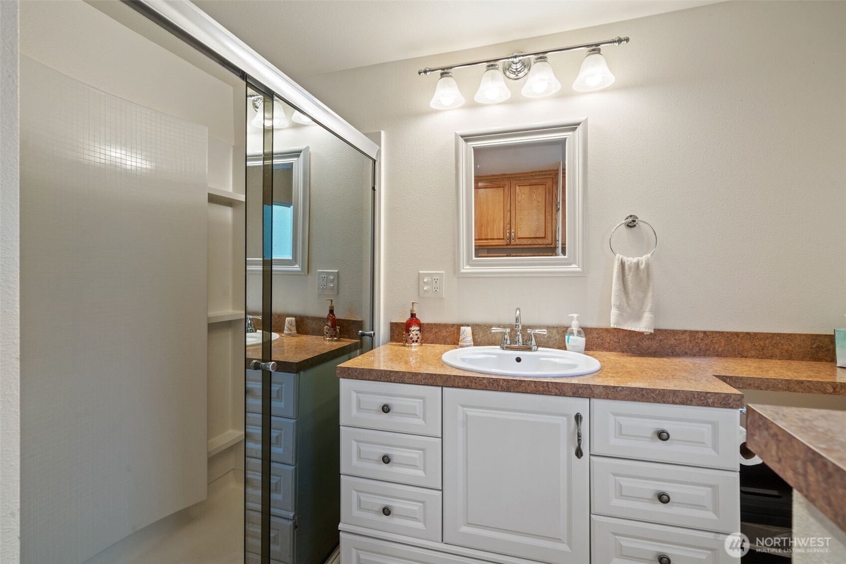 5026 Chico Way Northwest Bremerton, WA 98312 - Photo 12 of 36 a bathroom with a sink and a mirror