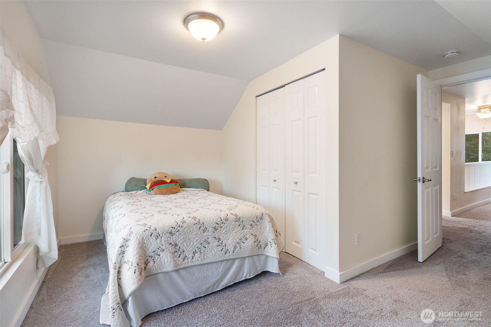 5026 Chico Way Northwest Bremerton, WA 98312 - Photo 15 of 36 a bedroom with a bed and a window