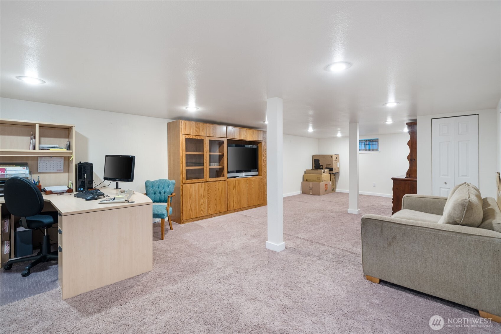 5026 Chico Way Northwest Bremerton, WA 98312 - Photo 19 of 36 a living room with furniture and a flat screen tv