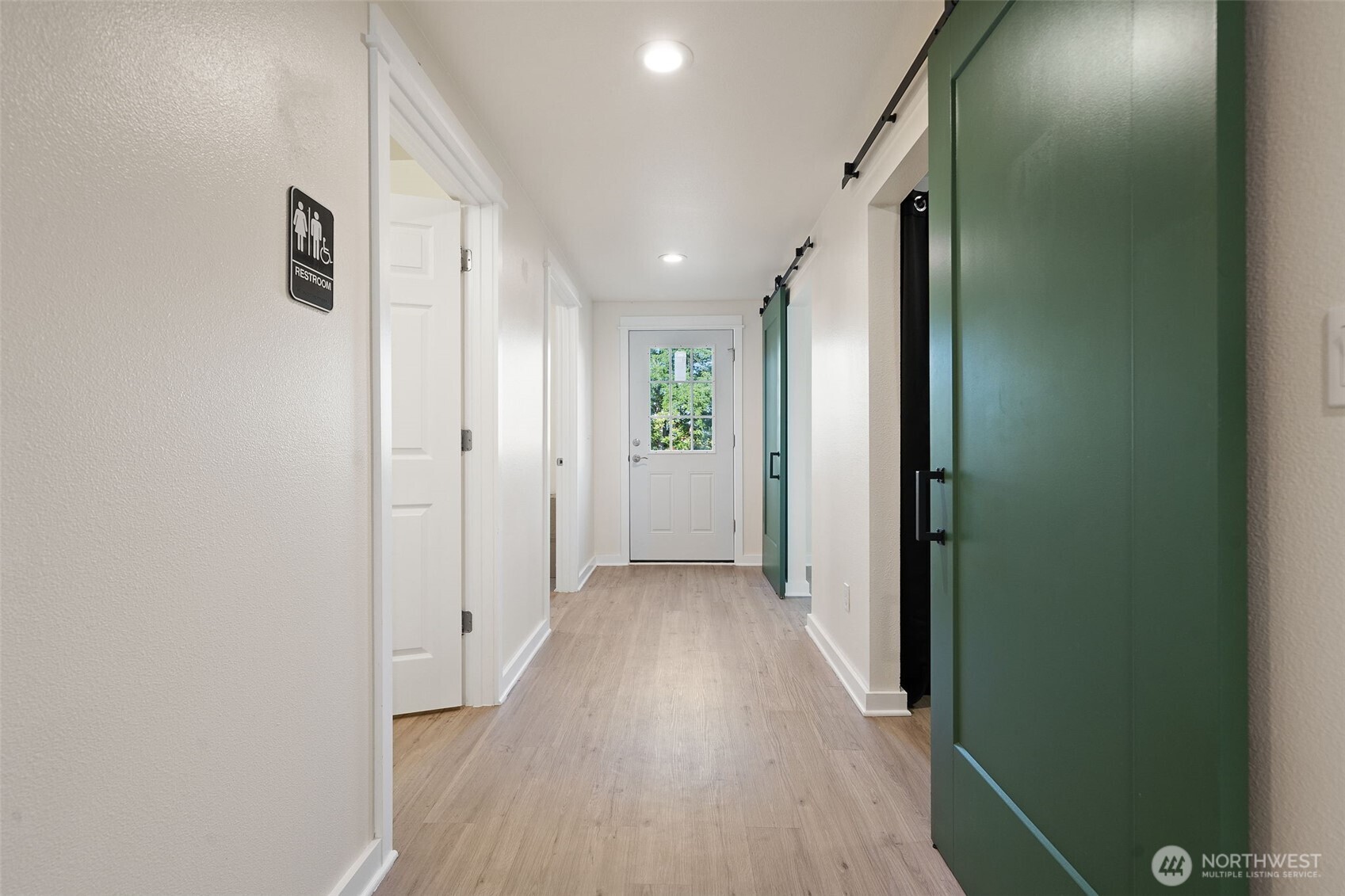 5026 Chico Way Northwest Bremerton, WA 98312 - Photo 30 of 36 a view of a hallway with wooden floor