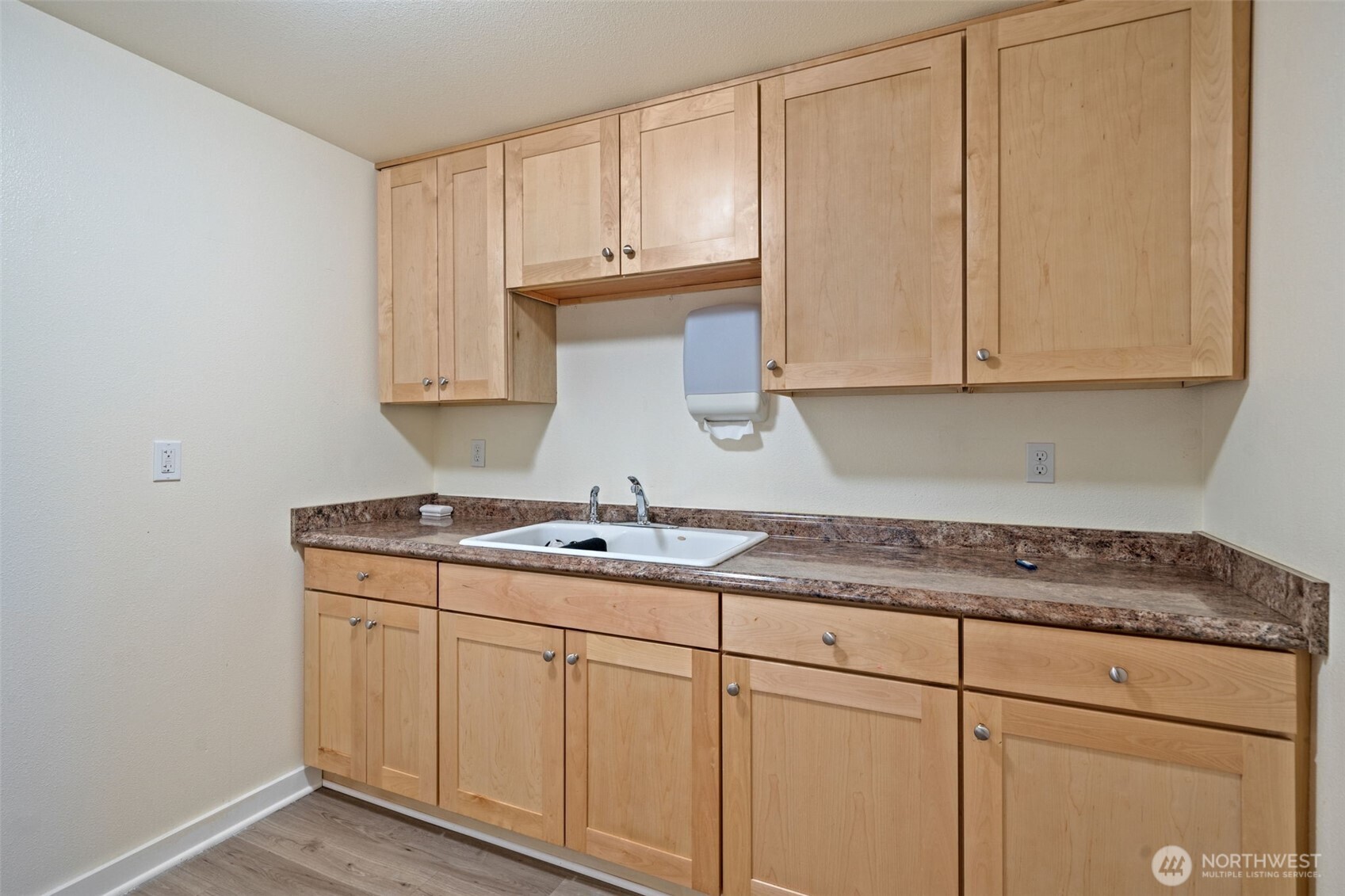 5026 Chico Way Northwest Bremerton, WA 98312 - Photo 32 of 36 a kitchen with granite countertop white cabinets and white appliances