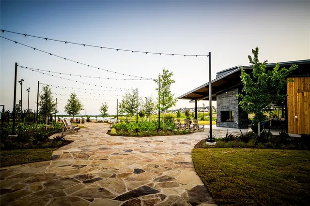 a view of a chairs and table in a patio