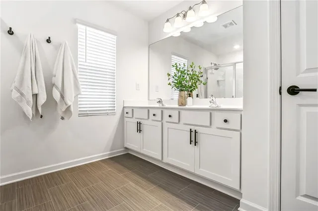 a view of cabinets with wooden floor