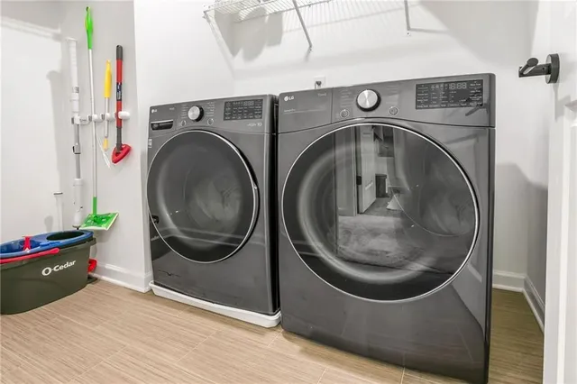 a utility room with dryer and washer