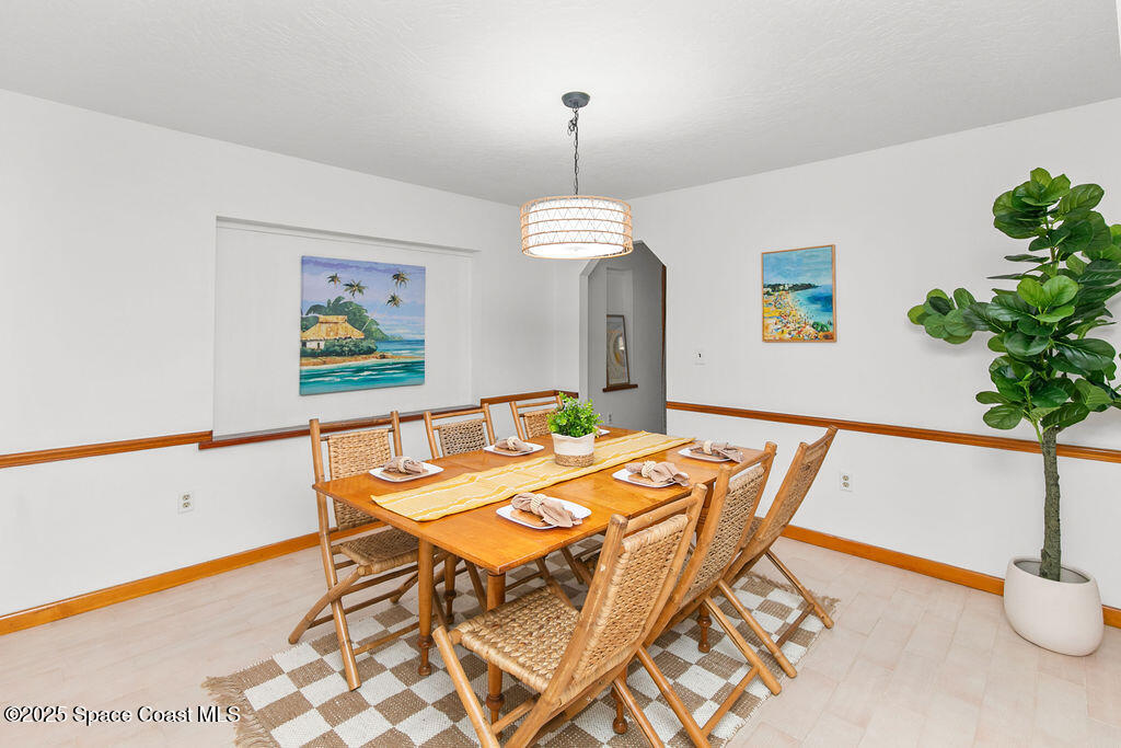 2524 Trotters Trail Cocoa, FL 32926 - Photo 11 of 46 a dining room with furniture and window