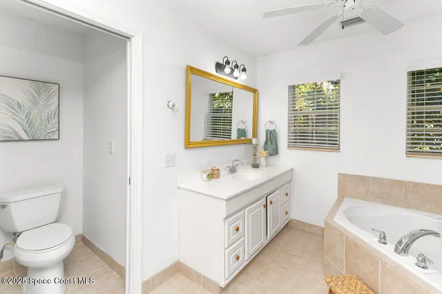 a bathroom with a sink and a window
