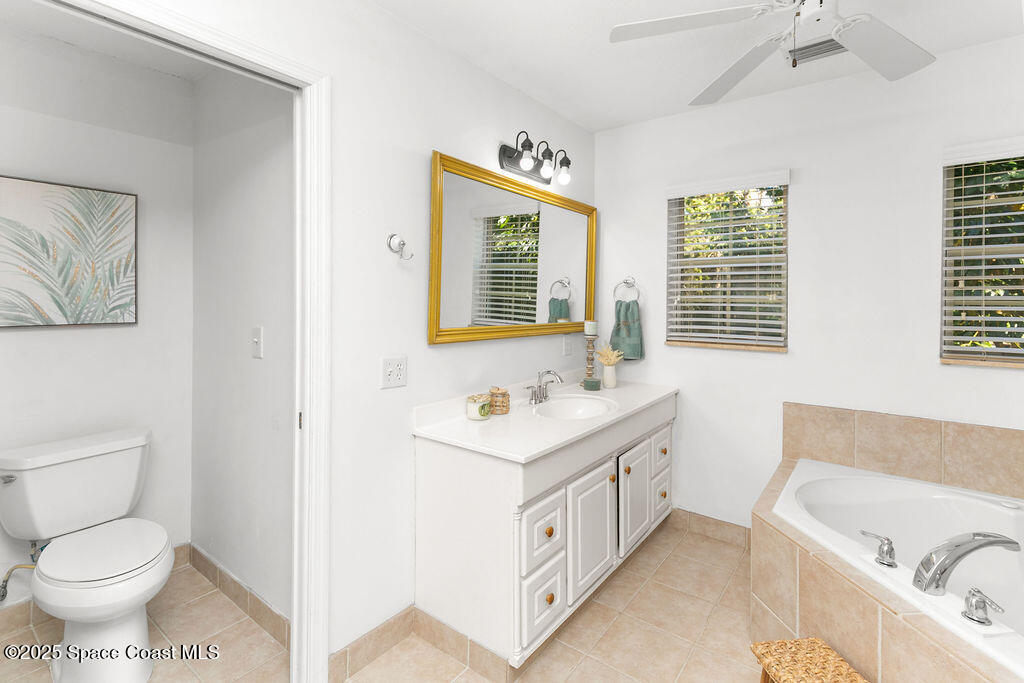 2524 Trotters Trail Cocoa, FL 32926 - Photo 19 of 46 a bathroom with a sink and a bathtub