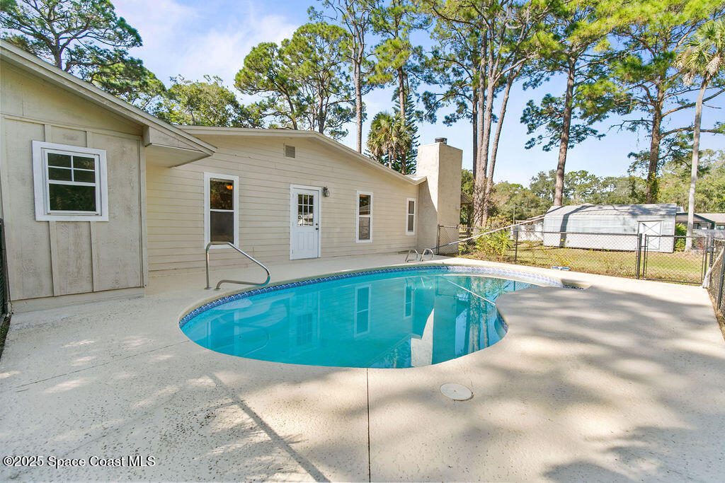 2524 Trotters Trail Cocoa, FL 32926 - Photo 33 of 46 a view of outdoor space yard and swimming pool