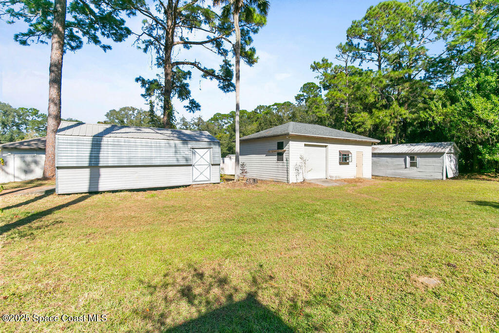 2524 Trotters Trail Cocoa, FL 32926 - Photo 36 of 46 a house view with swimming pool in front of it