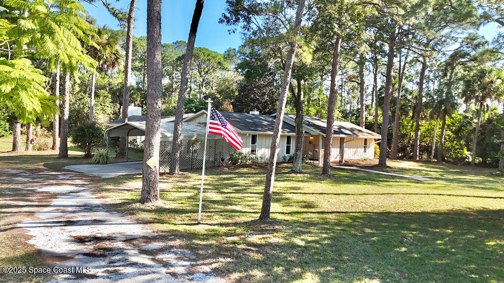2524 Trotters Trail Cocoa, FL 32926 - Photo 40 of 46 a view of a houses with basketball court
