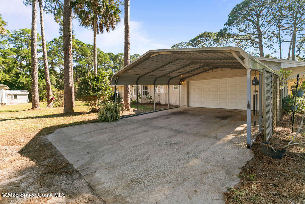 2524 Trotters Trail Cocoa, FL 32926 - Photo 42 of 46 a view of a house with a yard