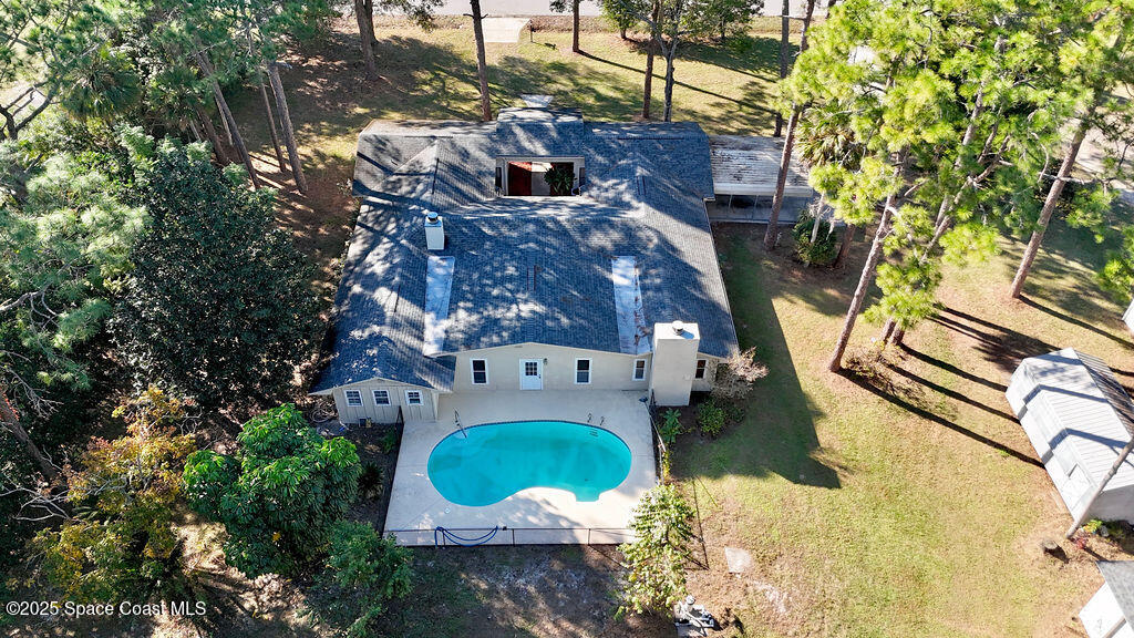 2524 Trotters Trail Cocoa, FL 32926 - Photo 43 of 46 a aerial view of a house with a yard