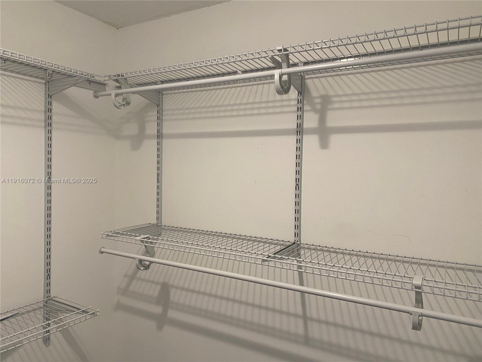 22970 Oxford Place, Unit A Boca Raton, FL 33433 - Photo 17 of 24 a bathroom with a window