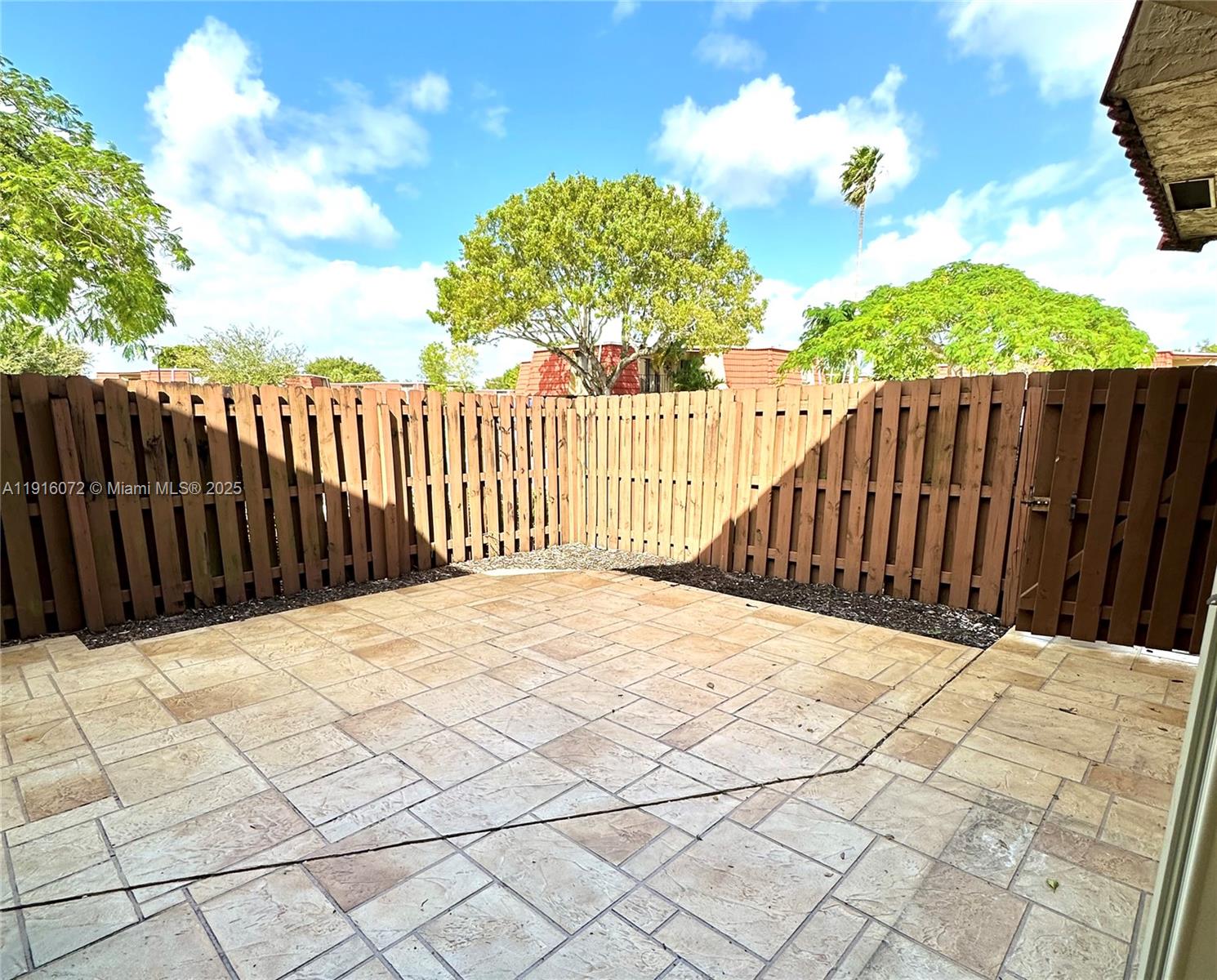 22970 Oxford Place, Unit A Boca Raton, FL 33433 - Photo 22 of 24 a view of a backyard