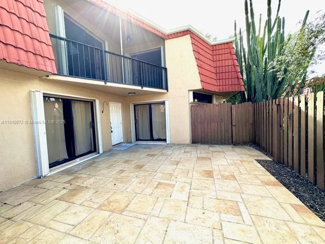 a view of a swimming pool with lounge chair