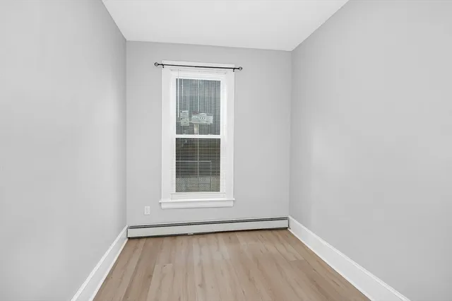 an empty room with window
