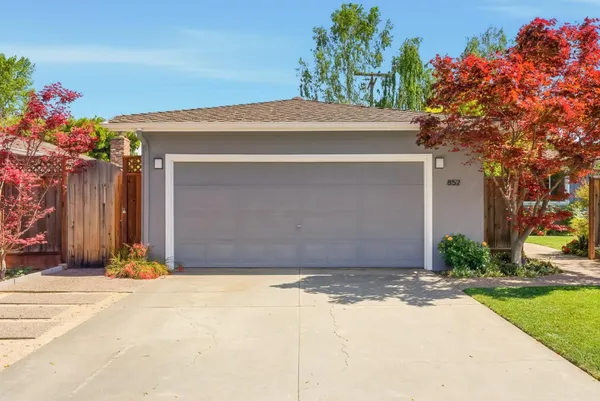 a front view of house with yard
