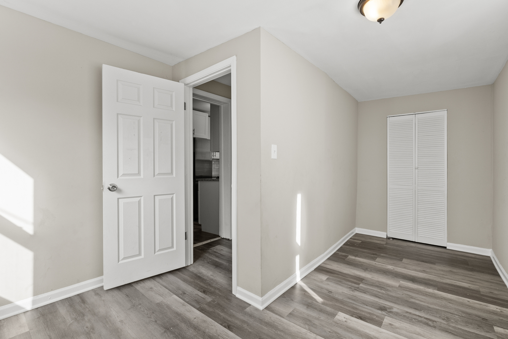 503 West 81st Street Chicago, IL 60620 - Photo 17 of 29 a view of a livingroom with wooden floor