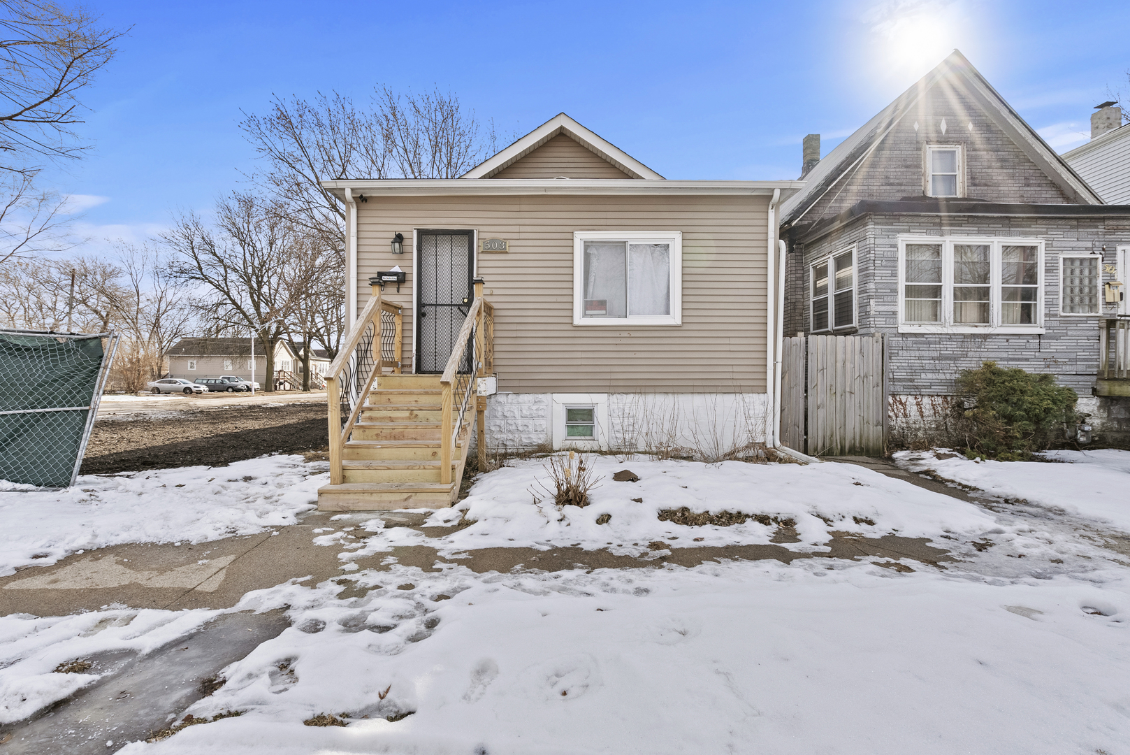 503 West 81st Street Chicago, IL 60620 - Photo 2 of 29 a front view of a house with a yard