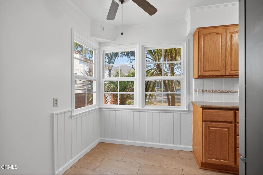 2418 Lexington Drive Ventura, CA 93003 - Photo 14 of 36 an empty room with windows closet and chandelier fan