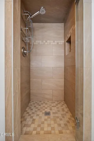 a view of a swimming pool with a yard