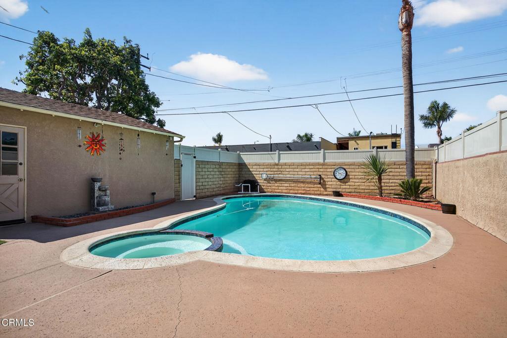 2418 Lexington Drive Ventura, CA 93003 - Photo 27 of 36 a view of a swimming pool with a yard