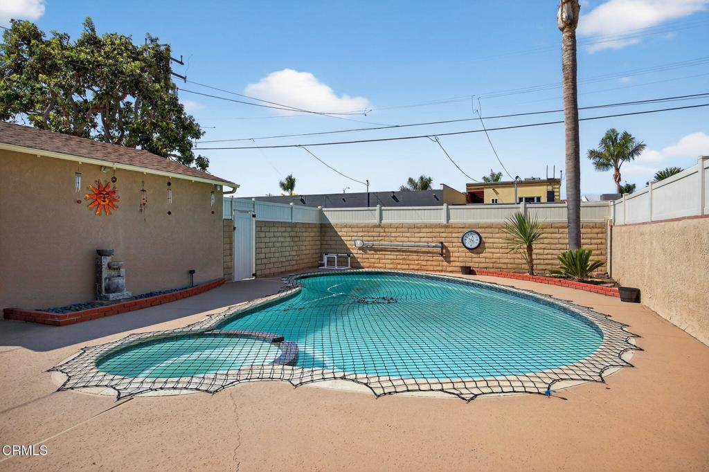 2418 Lexington Drive Ventura, CA 93003 - Photo 28 of 36 a view of a swimming pool with a yard