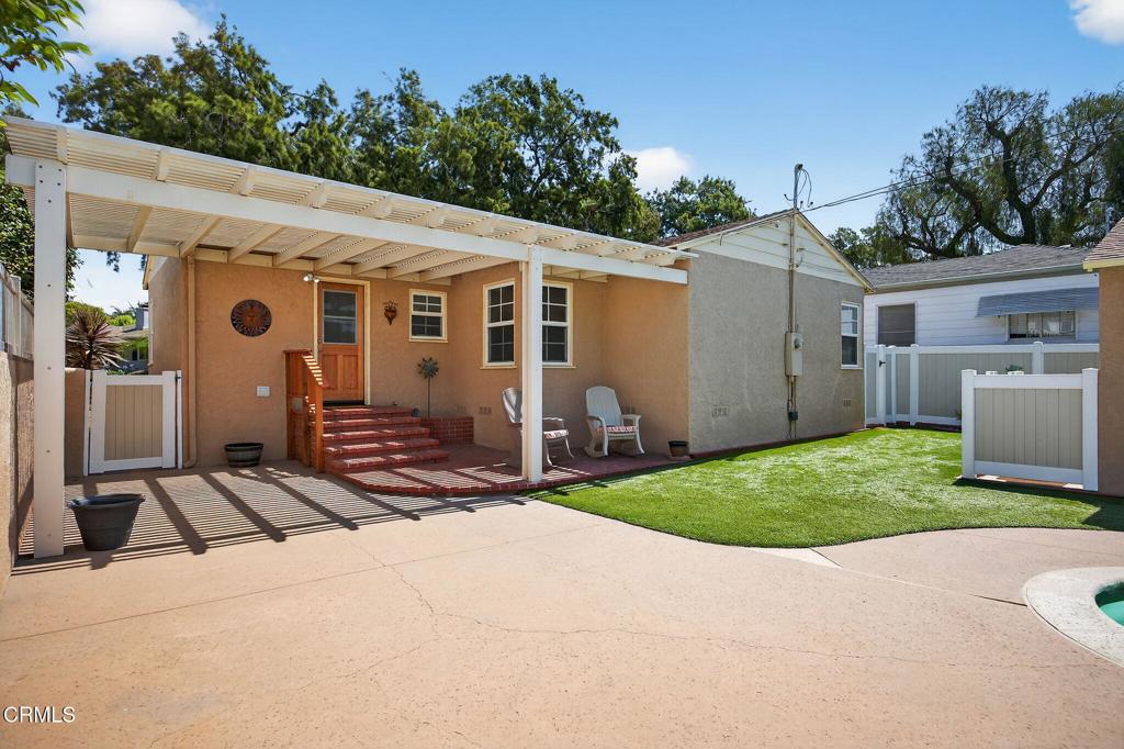 2418 Lexington Drive Ventura, CA 93003 - Photo 31 of 36 a view of a house with backyard and a tree