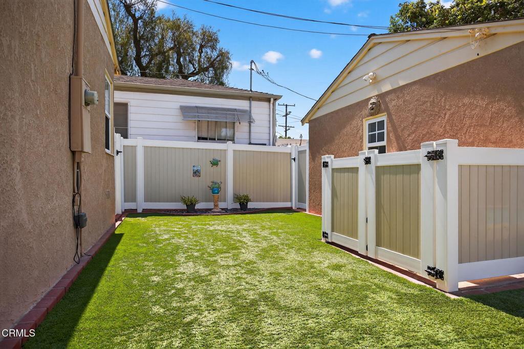 2418 Lexington Drive Ventura, CA 93003 - Photo 32 of 36 a view of a backyard with flat screen tv and a yard