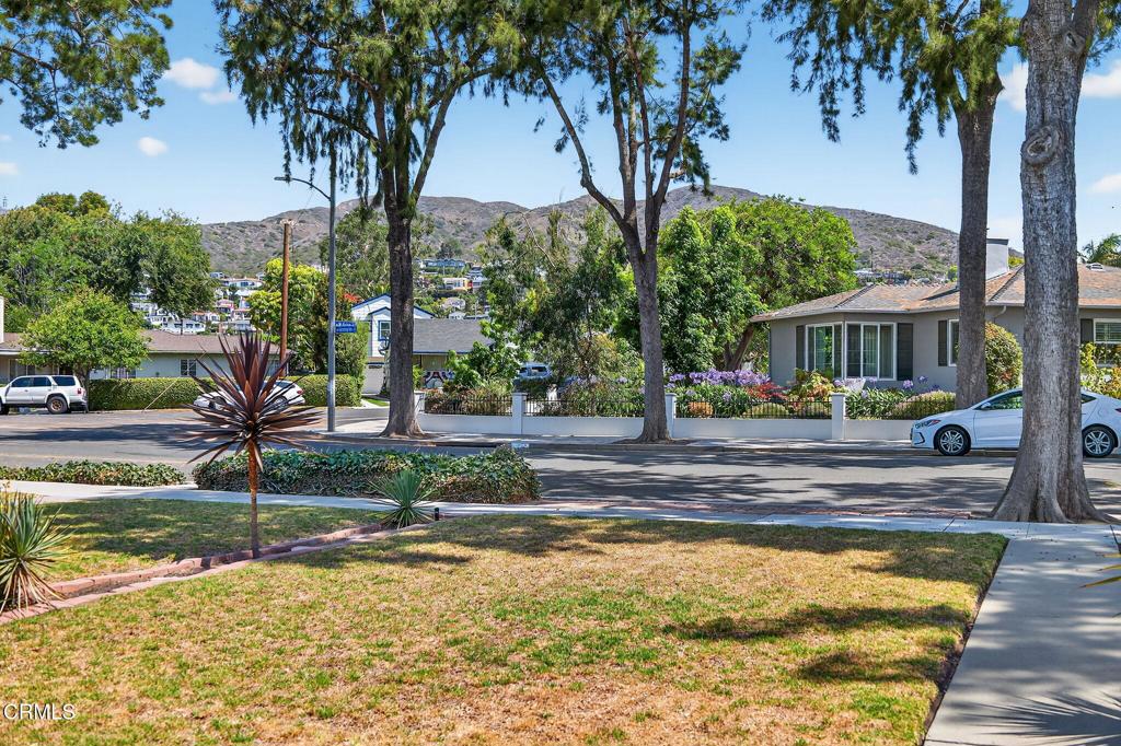 2418 Lexington Drive Ventura, CA 93003 - Photo 4 of 36 a view of swimming pool and trees in the background