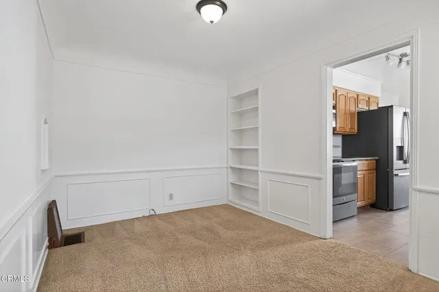 a view of livingroom with furniture and window