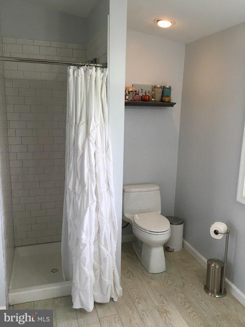 4262 Lynhurst Road Baltimore, MD 21222 - Photo 18 of 30 Modern Master Bath with Tile Floors, Shower
