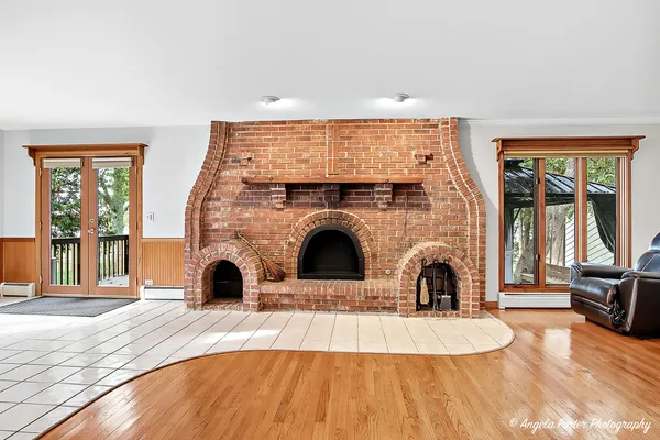 a view of a livingroom with a fireplace