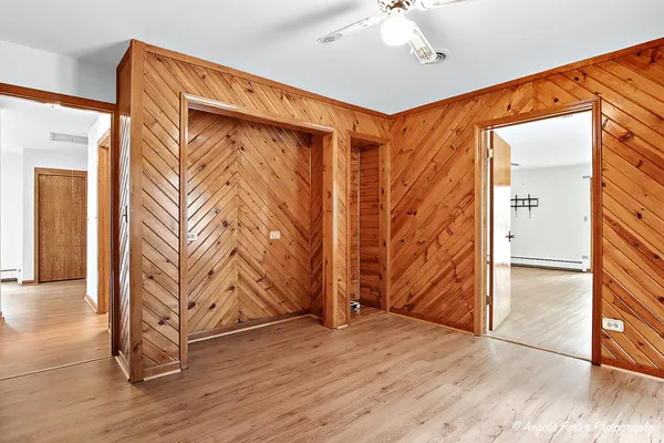 a view of entryway with wooden floor