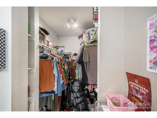 a view of a hallway with a flower pot