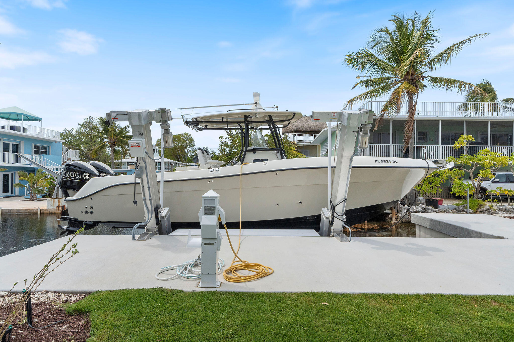 1002 Snapper Lane Key Largo, FL 33037 - Photo 67 of 106 a view of a house with backyard and sitting area