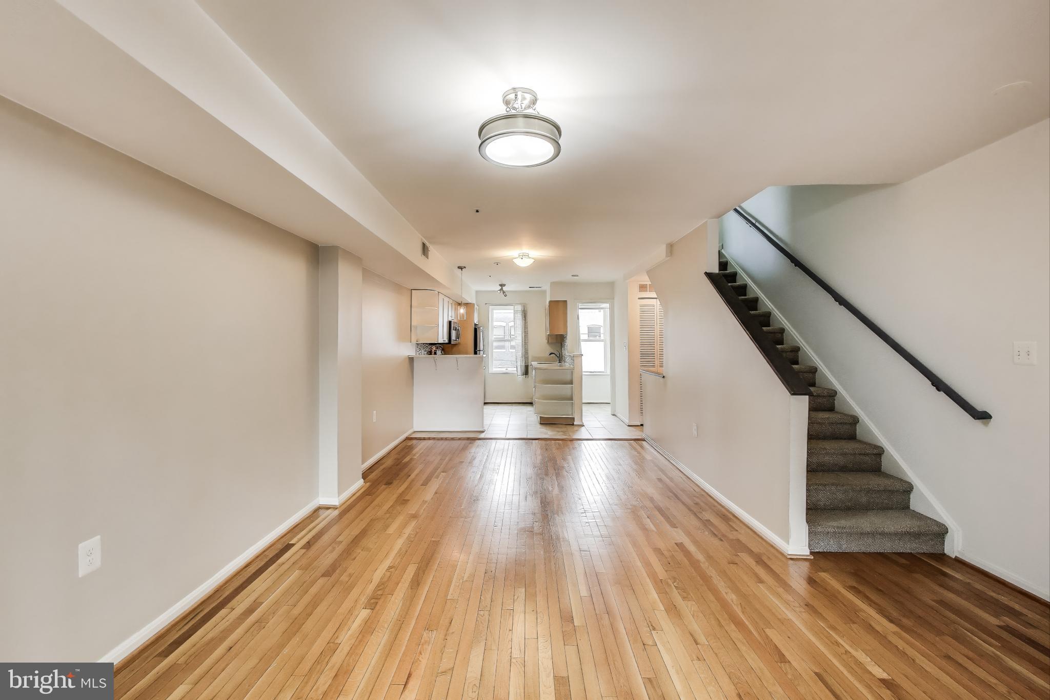763 3rd Street Northeast Washington, DC 20002 - Photo 11 of 32 a view of entryway and hall with wooden floor